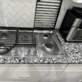 Burner cleaning in Whirlpool Cooktop Burner cleaning in Whirlpool Cooktop